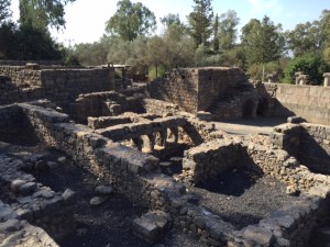 Ruins of the village, over the top of the wall to the right you can see the column tops of the synagogue and top left is the house that has the kitchen and some of the rooms recreated.