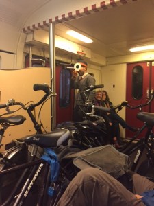 Pamela and her childhood friend chatting with the conductor. He's showing us the high tech green light sign.