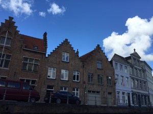 Peaked and crenellated roofs along the canals are a hallmark of the Flemish style of architecture.