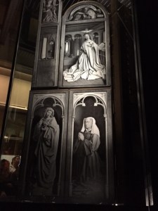 The back side showing black and white photo images of the portions in restoration.