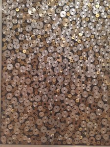 Arman, "Nuclear Particle", 1964, gear wheels, plastic, wood