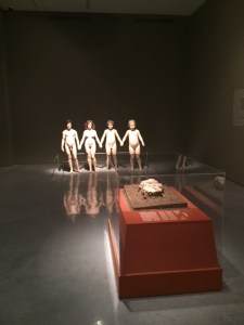 The Family: Charles Ray, "Family Romance", 1992-95, mixed media and Plastered skulls in the foreground 9000 BCE all found together in a family burial.