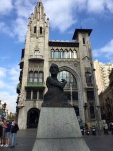 I don't know who the sculpture is supposed to be (reminds me of Cervantes) or what the building is but the combination of the modern and the old gives you and idea of how intermixed the styles are.