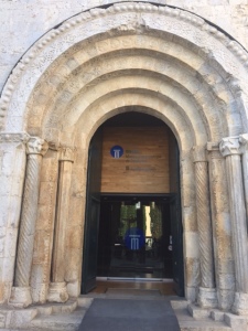 Entrance to the Romanesque church (film museum).  You can see why it is called Romanesque as it uses classical elements of arch and column but is not very embellished.