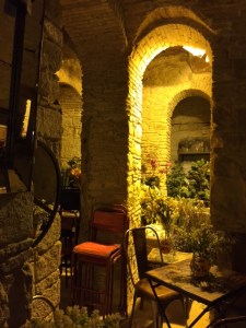 This is what we found at the back of the store- it's the Mikveh (ritual bath). When the store wanted to expand they broke through an existing wall and found this.  They needed to bring in the antiquities authorities who excavated the entire area and determined this was where the Jewish community in the 14th century had their Mikveh.  If you remember, the Black Plague killed 60% of the population but very few of them were Jews.  So the Jews were blamed for the plague.  It was simple hygiene that saved the Jews and here is where they practiced it.  It's now part of a knick knack store and the original Jewish community is gone.  But our guide for this tour is Jewish and everyone on our tour (6 adults and my grandson) are Jewish, and Barcelona has a small but vibrant Jewish community again. 
