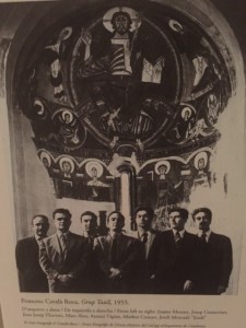 Antoni Tapies, a native son of Barcelona is shown in this photograph with other artists in front of the "Christ in Majesty" when it was installed