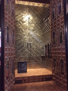 One wall of the main hall had these huge doors that could be opened to reveal a small chapel where religious services could be conducted or entertainments could be had when the doors were closed.