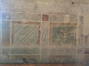 This is a bit of wall painting left that is a great example of Trompe L'oeil.