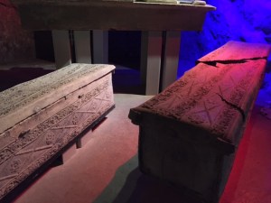 Coffins made of leather or lead.