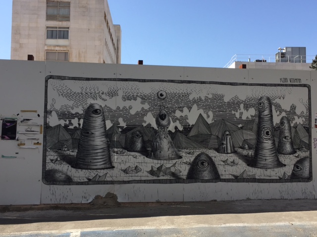 Enjoyed this very detailed graphic on the wall of a construction zone- reminded me of some of Breughel's prints (we'll see some of them in the Baroque period).